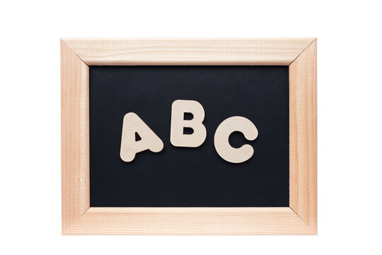 Word ABC from wooden letters. The concept of the importance of education. Wooden frame on white background