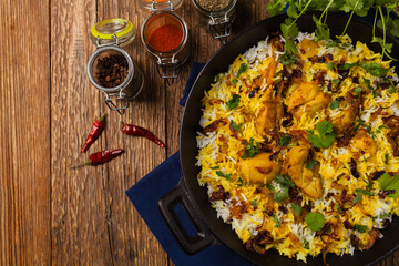 Biryani with chicken. Traditional Indian dish of rice and chicken marinated in spices and yoghurt.