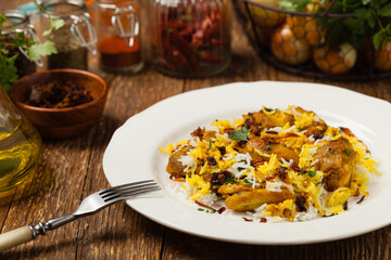 Biryani with chicken. Traditional Indian dish of rice and chicken marinated in spices and yoghurt.