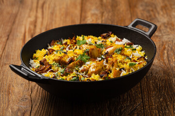Biryani with chicken. Traditional Indian dish of rice and chicken marinated in spices and yoghurt.