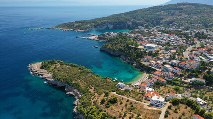 Aerial drone photo of famous small fishing port and village of Rousoum Gialos next to Votsi in island of Alonissos, Sporades, Greece