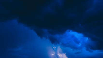 Lightning On Background Of Night Stormy Sky Before Rain. Cloudy Sky