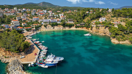 Fototapeta na wymiar Aerial drone photo of famous small fishing port and village of Votsi in island of Alonissos, Sporades, Greece