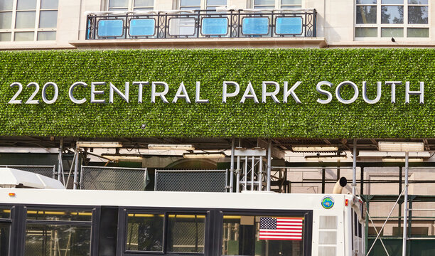 New York, USA - July 01, 2018: 220 Central Park South sign on the facade of residential skyscraper along Central Park South in Midtown Manhattan.