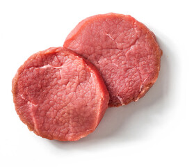 Raw beef meat isolated on white, from above