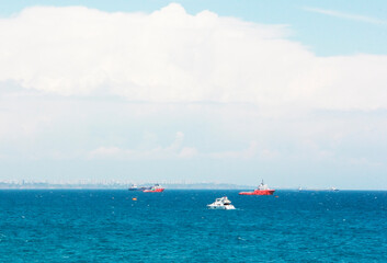 Obraz premium Antalya, Turkey, may 23, 2020. White motor yacht on the waves of the blue a sea
