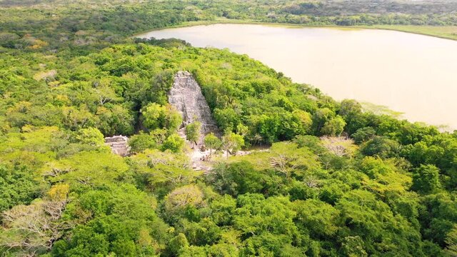 Aerial view of Coba Ruins surrounded by trees in Quintana Roo, Mexico.