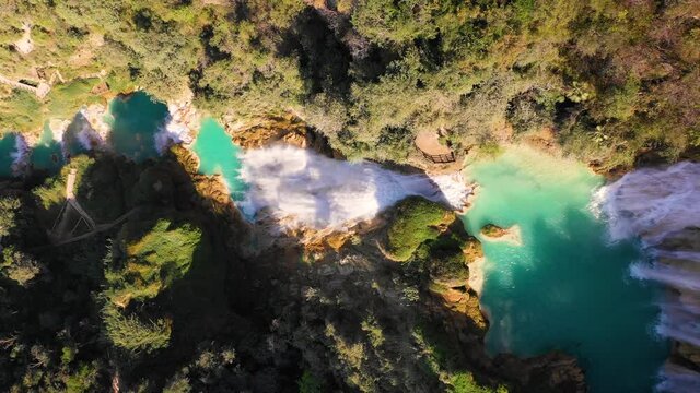 Aerial view of El Chiflon Waterfalls surrounded by trees in Chiapas, Mexico.