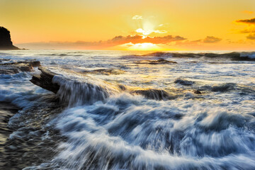 Sea BB Lean rock east red sun