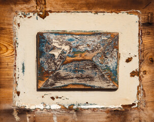 Rectangular wood frame with grinded brown surface