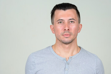 Portrait of young handsome man with beard stubble