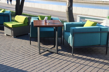 hookah pub terrace interior with cozy green seats