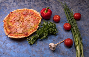 Tasty pepperoni pizza on vintage style wood background