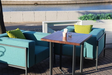 hookah pub terrace interior with cozy green seats