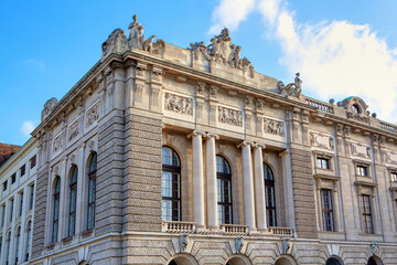 Fototapeta na wymiar Vienna Hofburg Architecture . Building with sculptures on top in Vienna downtown