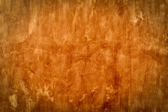 Cement wall texture background - old cement concrete wall with red warm light filter