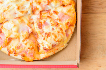 Home made pizza on wood plate