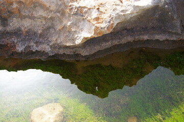 Rock reflection in the sea