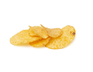 heap of corrugated round yellow fried potato chips isolated on white background