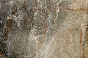 Original marble texture with dirt and rusty metal paint. Abstract background with scratches and splatters of paint, dripping, and splatters.