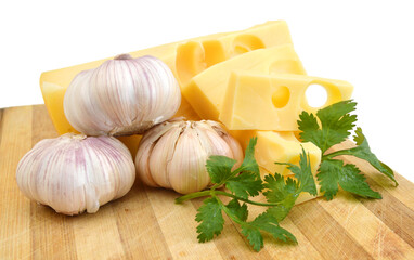 piece of cheese isolated on wooden board