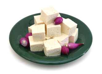 Tofu cubes on plate isolated on white