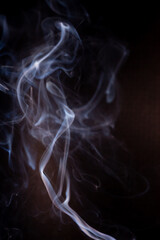 Smoke motion on black background.