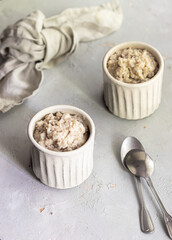 Coconut oatmeal with mango puree 