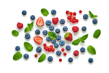 Fototapeta na wymiar Blueberry, raspberry, blackberry, redcurrant, strawberry, cherry isolated on white. Fresh blueberry, red berries mix closeup. Raspberry, mint creative composition.