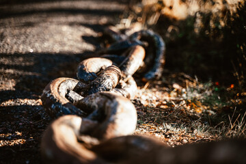 iron chain weighs on the pipe as a background for designers and artist
