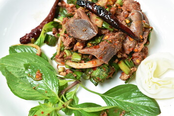 Thai spicy chop duck meat salad eat couple  fresh cabbage and Vietnamese coriander on plate