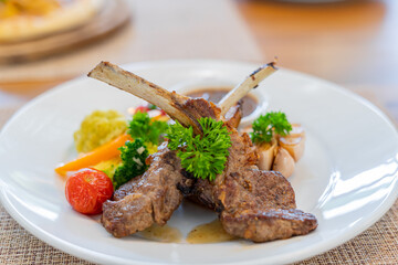 Grilled lamb on the plate ready to eat
