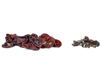 Dry and rehydrated chinese black muer mushroom isolated on white background