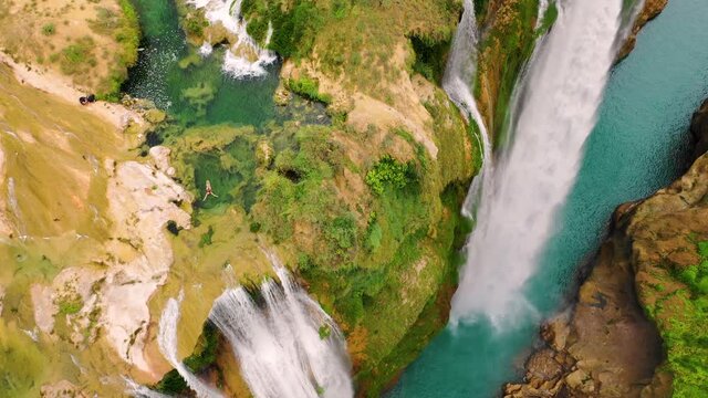 Aerial view of Tamul Waterfall with turquoise water in San Luis Potosi, Mexico.