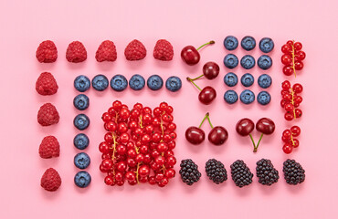 Blueberry, raspberry, blackberry, redcurrant, strawberry, cherry layout. Fresh blueberry, berries mix on pink. Red raspberry, mint creative composition. Colorful concept, top view.