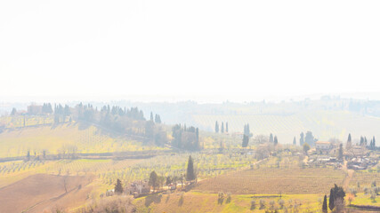 Early foggy morning. Beautiful spring landscape in Tuscany, Italy, Europe