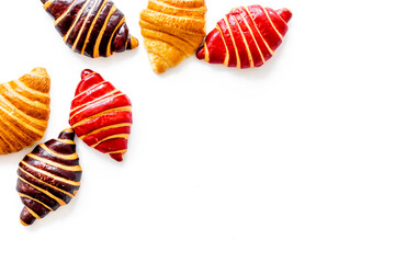 Frame of croissants - fresh bakery on white background