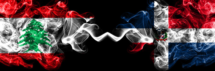 Lebanon vs Dominican Republic smoky mystic flags placed side by side. Thick colored silky abstract...