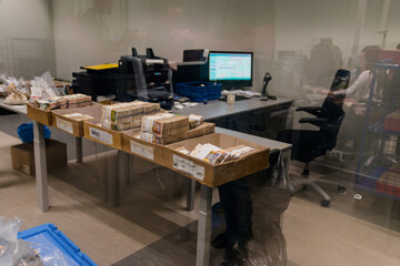 Carton boxes full of various types of banknotes