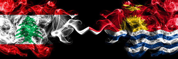Lebanon vs Kiribati smoky mystic flags placed side by side. Thick colored silky abstract smoke flags.