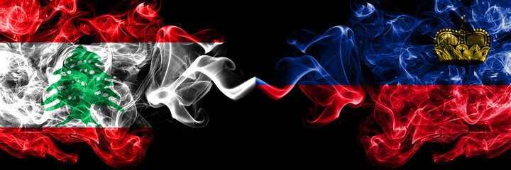 Lebanon vs Liechtenstein, Liechtensteins smoky mystic flags placed side by side. Thick colored silky abstract smoke flags.