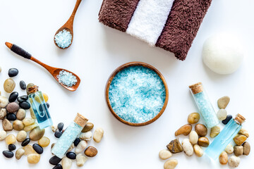 Spa set of blue sea salt, cosmetic clay and aroma oil. Top view