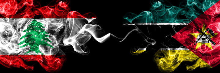 Lebanon vs Mozambique, Mozambican smoky mystic flags placed side by side. Thick colored silky abstract smoke flags.