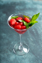 Raspberry martini cocktail. Selective focus. Shallow depth of field.

