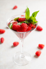 Raspberry martini cocktail. Selective focus. Shallow depth of field.
