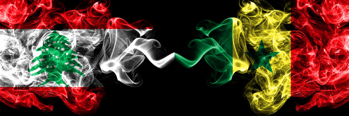 Lebanon vs Senegal, Senegalese smoky mystic flags placed side by side. Thick colored silky abstract smoke flags.