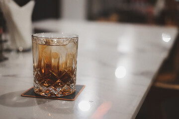 Glass of whiskey mix soft drink with ice