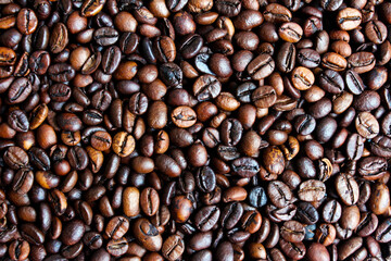 Fototapeta premium Roasted coffee beans background. Coffee background