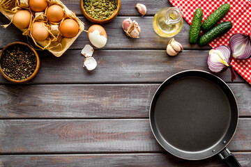Above view of country dinner table with effs, bread, potatoes