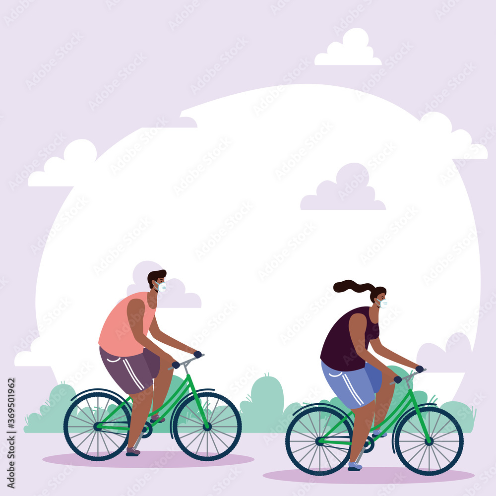 Wall mural afro young couple wearing medical masks in bicycles